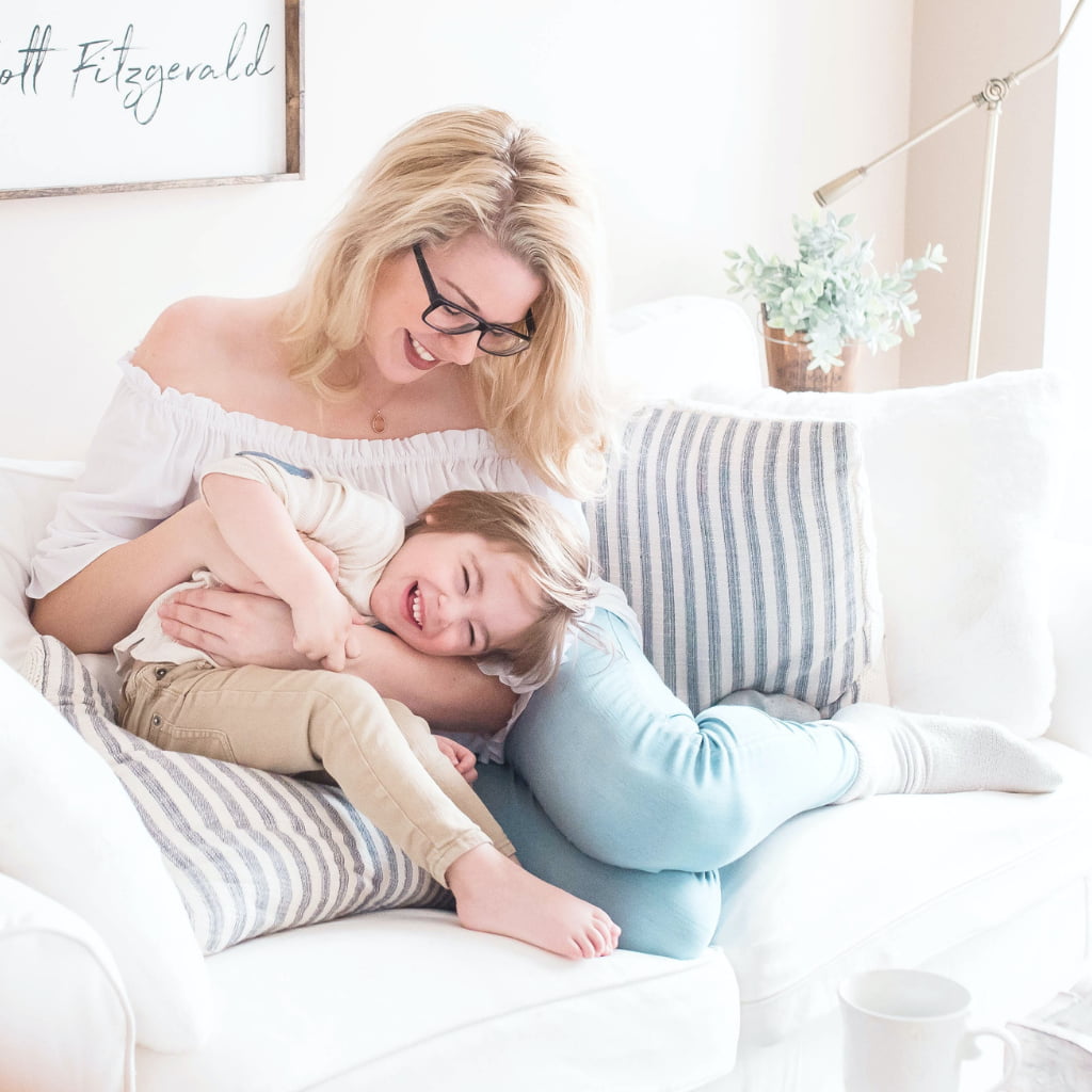 Mother and young daughter at home